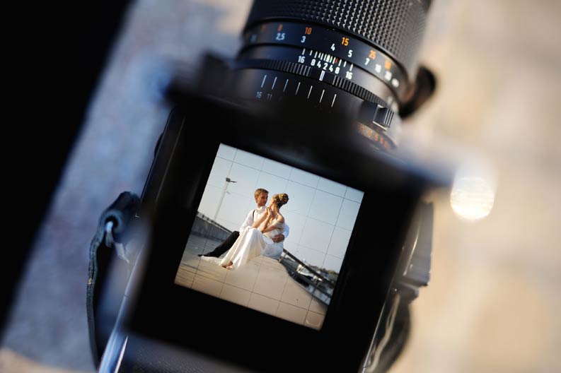 Profi Fotoaufnahmen vom Fotografen bei der Hochzeit